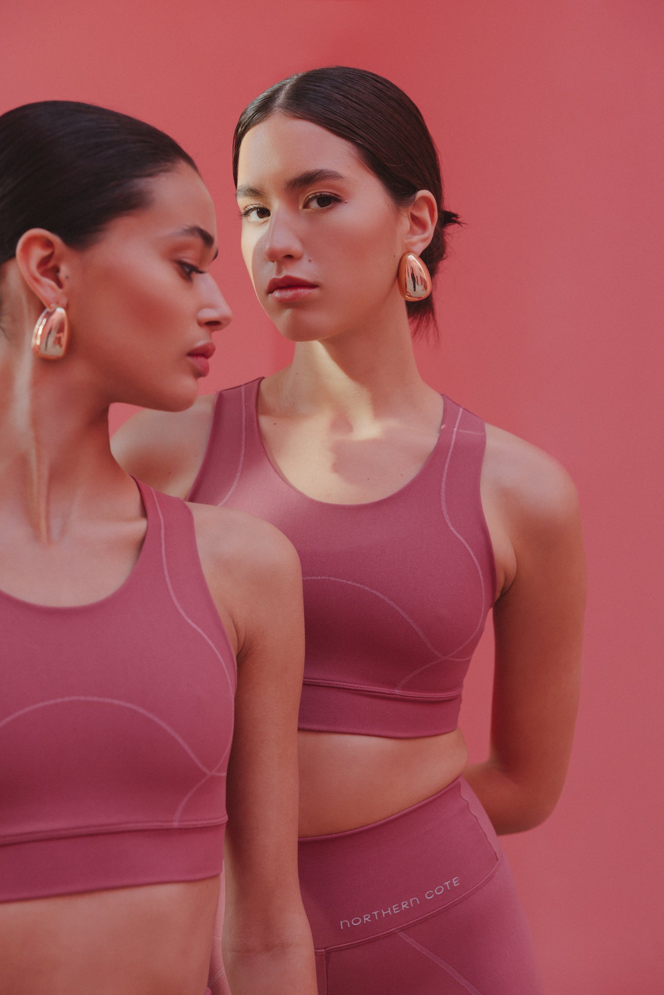 collection of women's gym clothing in various colors and styles