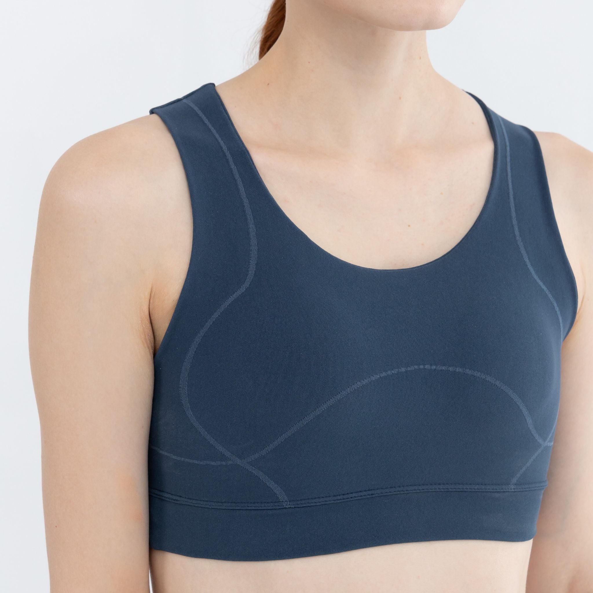 Side view of lightweight medium impact sports bra for women