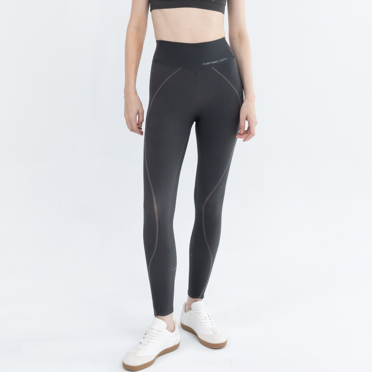 Woman wearing workout leggings and exercise tights during gym workouts