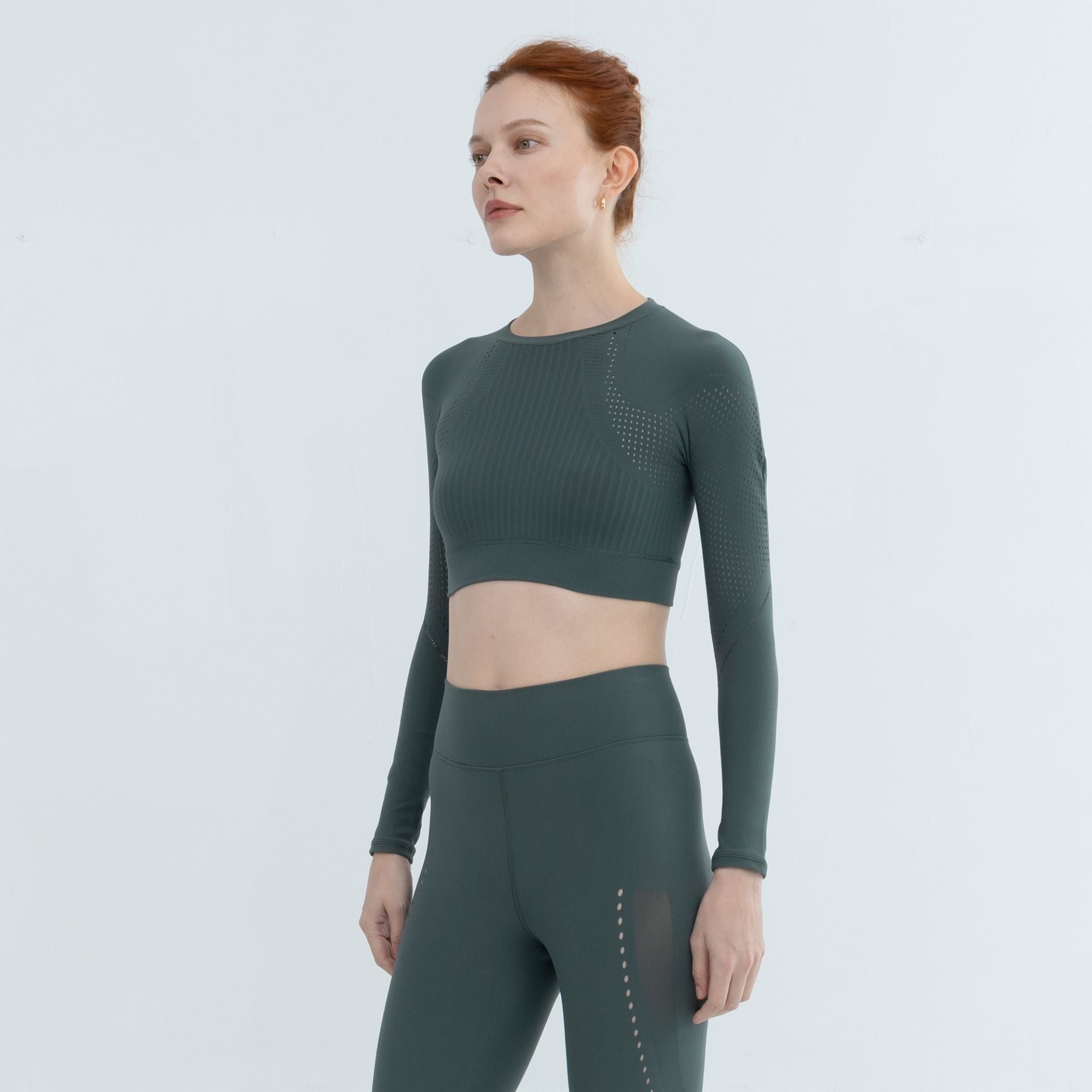 Athleisure look featuring cropped top and leggings in matching pine set