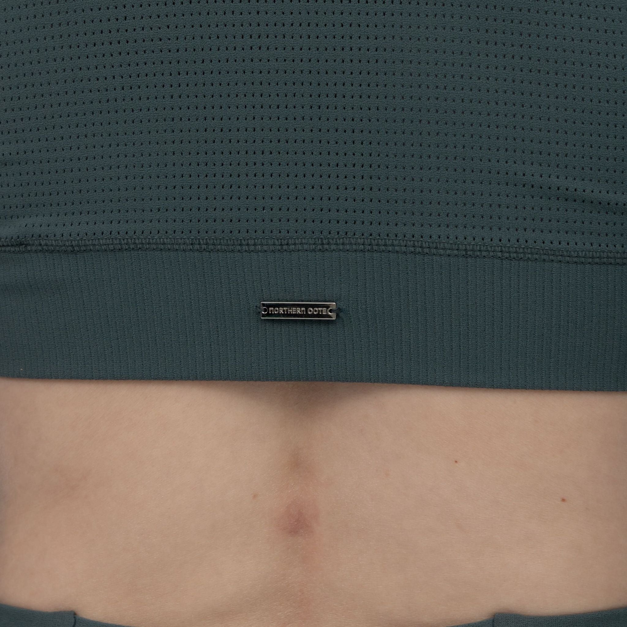 Close-up of pine cropped sweatshirt fabric