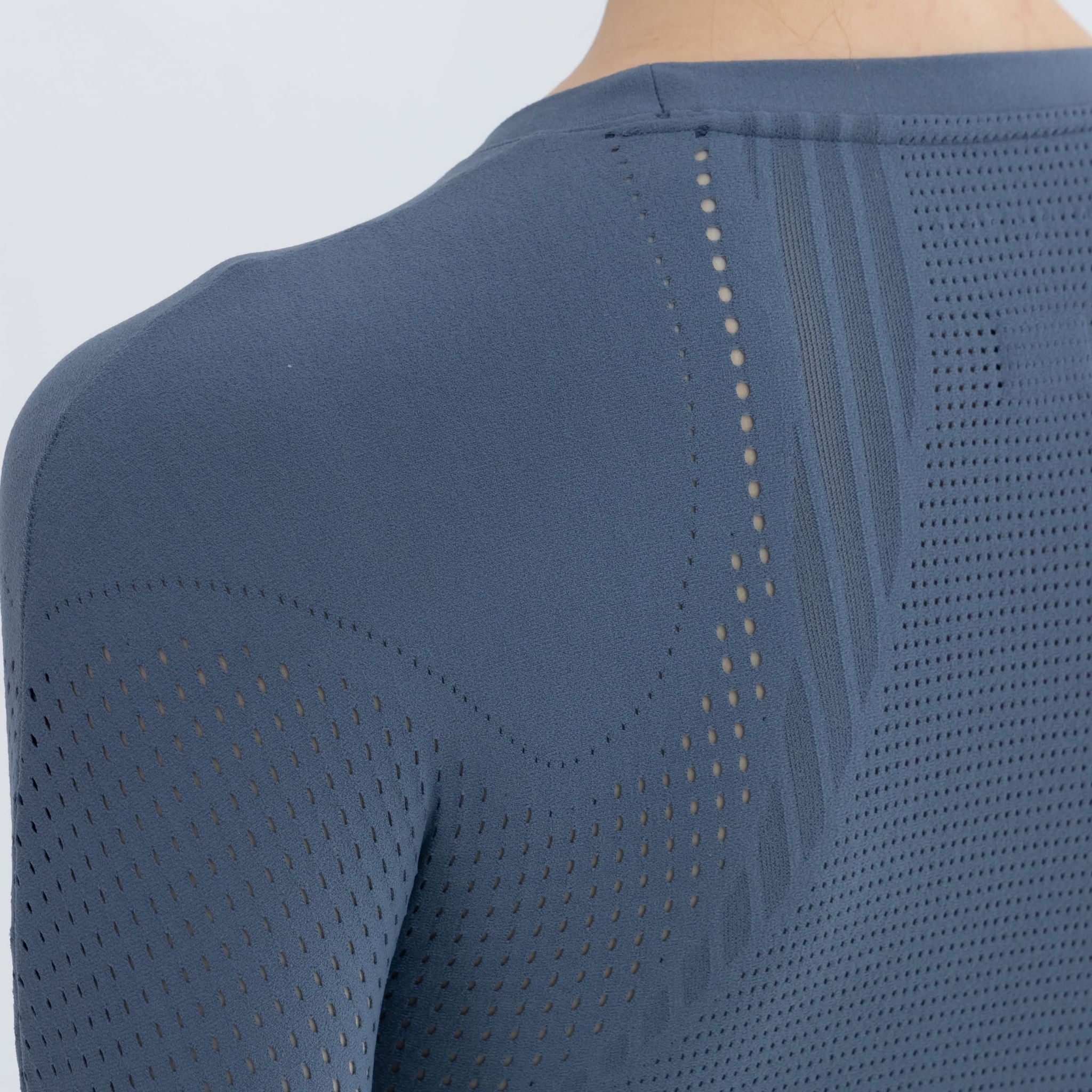 Back view of Smoky Blue pullover showing seamless design