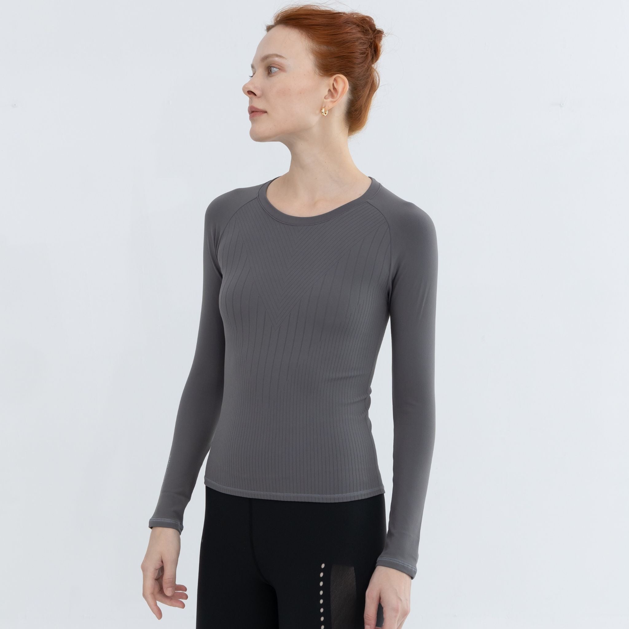 Glimmer seamless pullover for workouts.