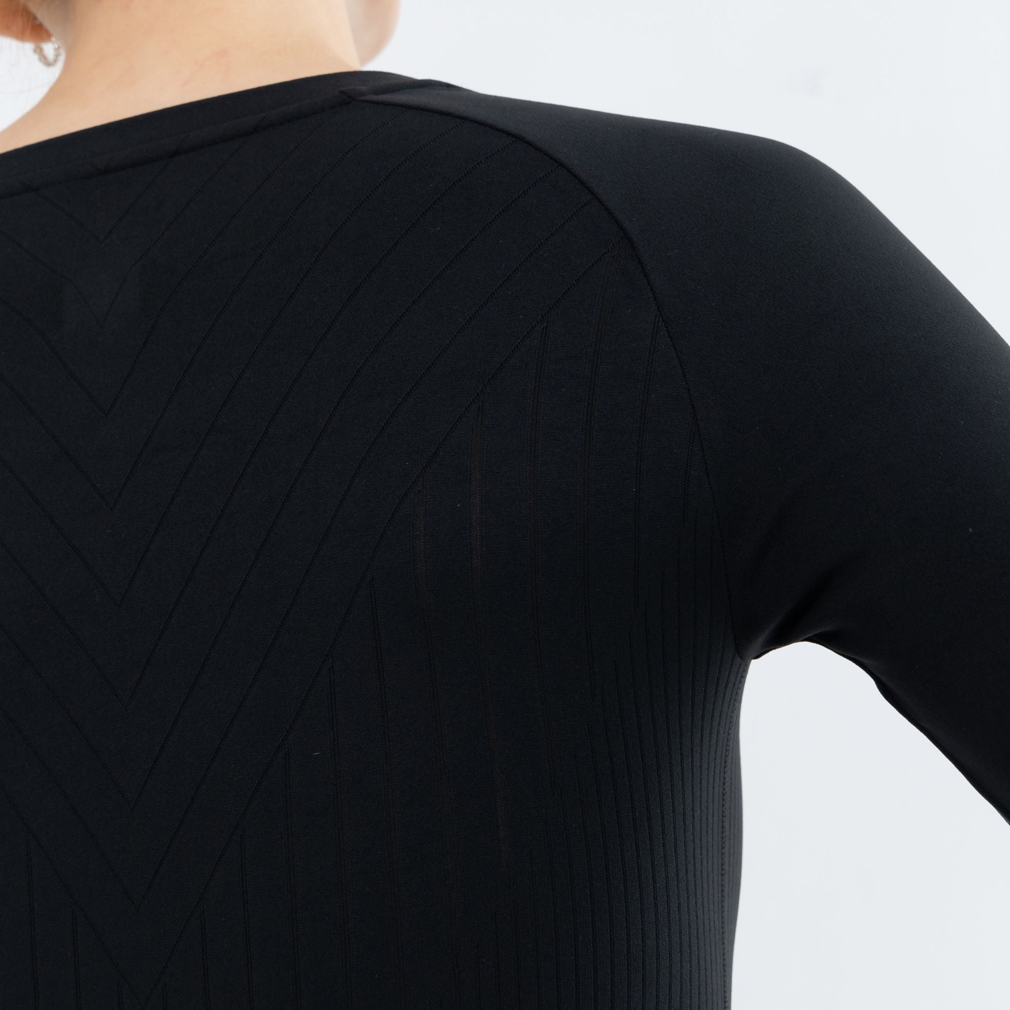 Back view of Fitness Pullover with leaf pattern detail