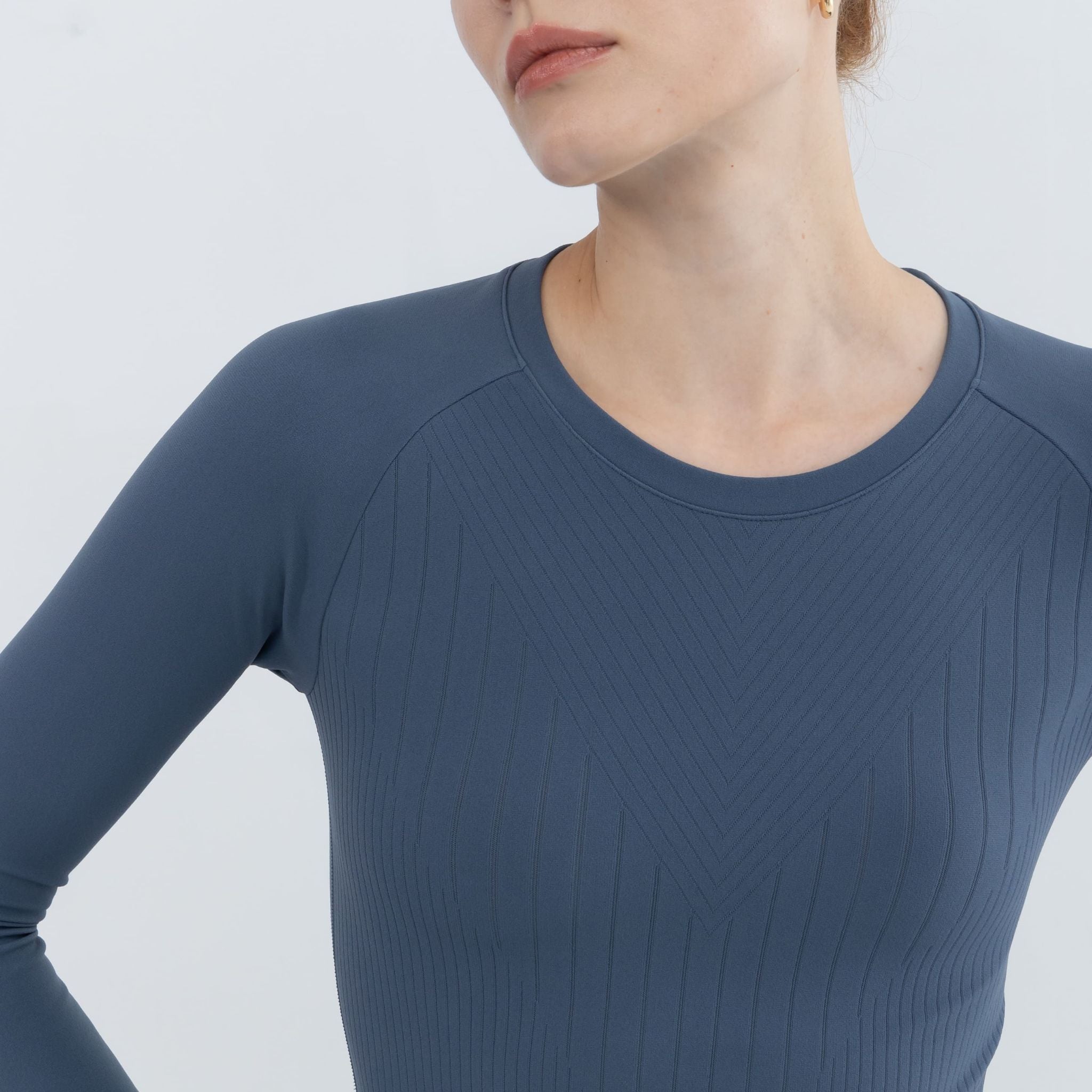 Seamless Pullover For Workouts in studio lighting