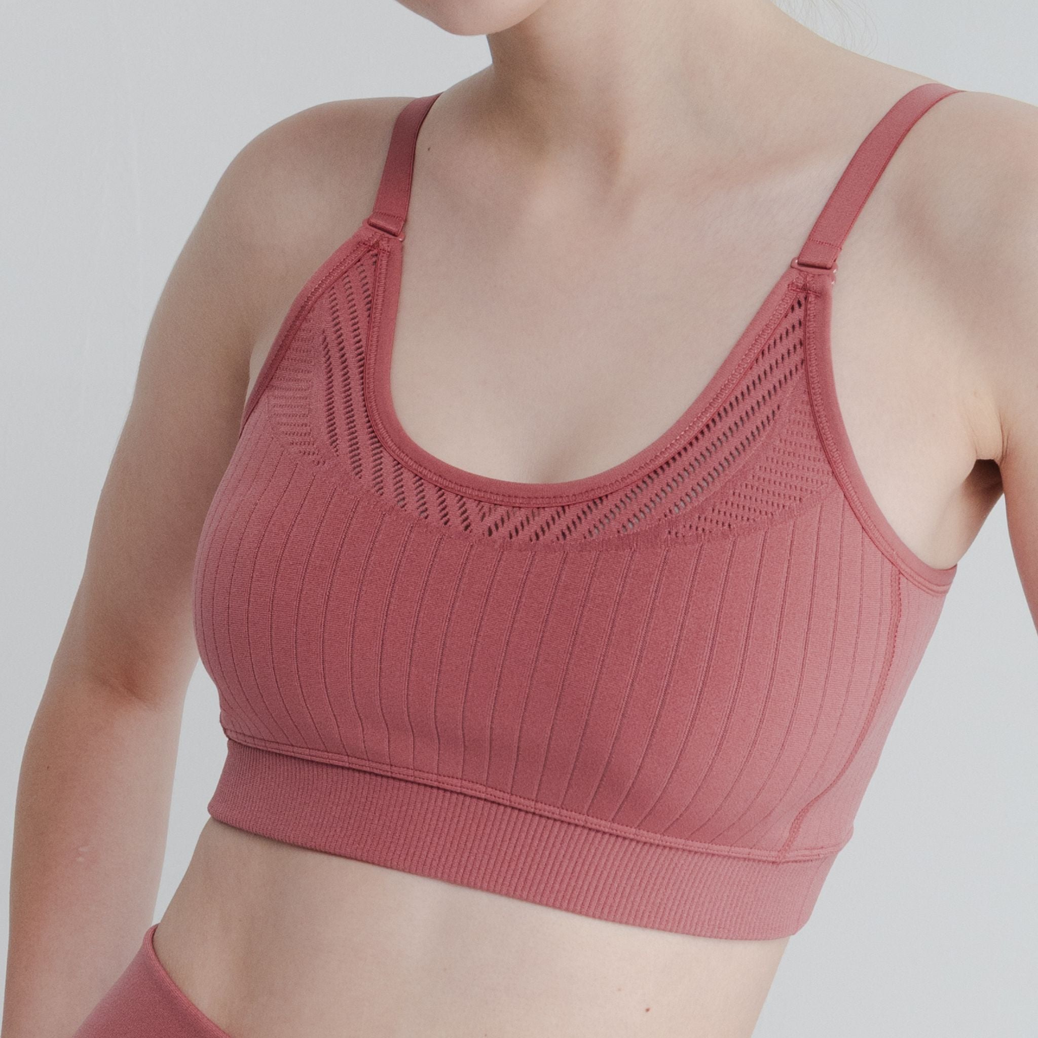 High-stretch, open back bra type ideal for yoga, pilates, and casual wear, merging functionality with fashion.