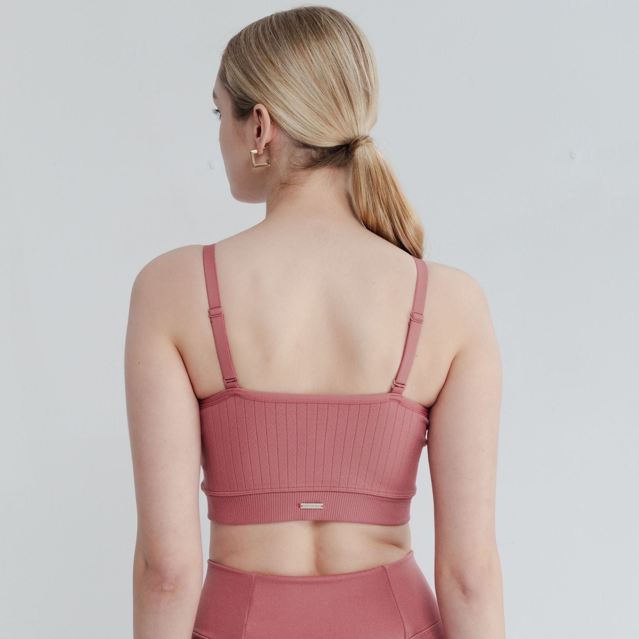 Elegant and lightweight open back bra styled for minimal support, combining fashion-forward design with everyday comfort.