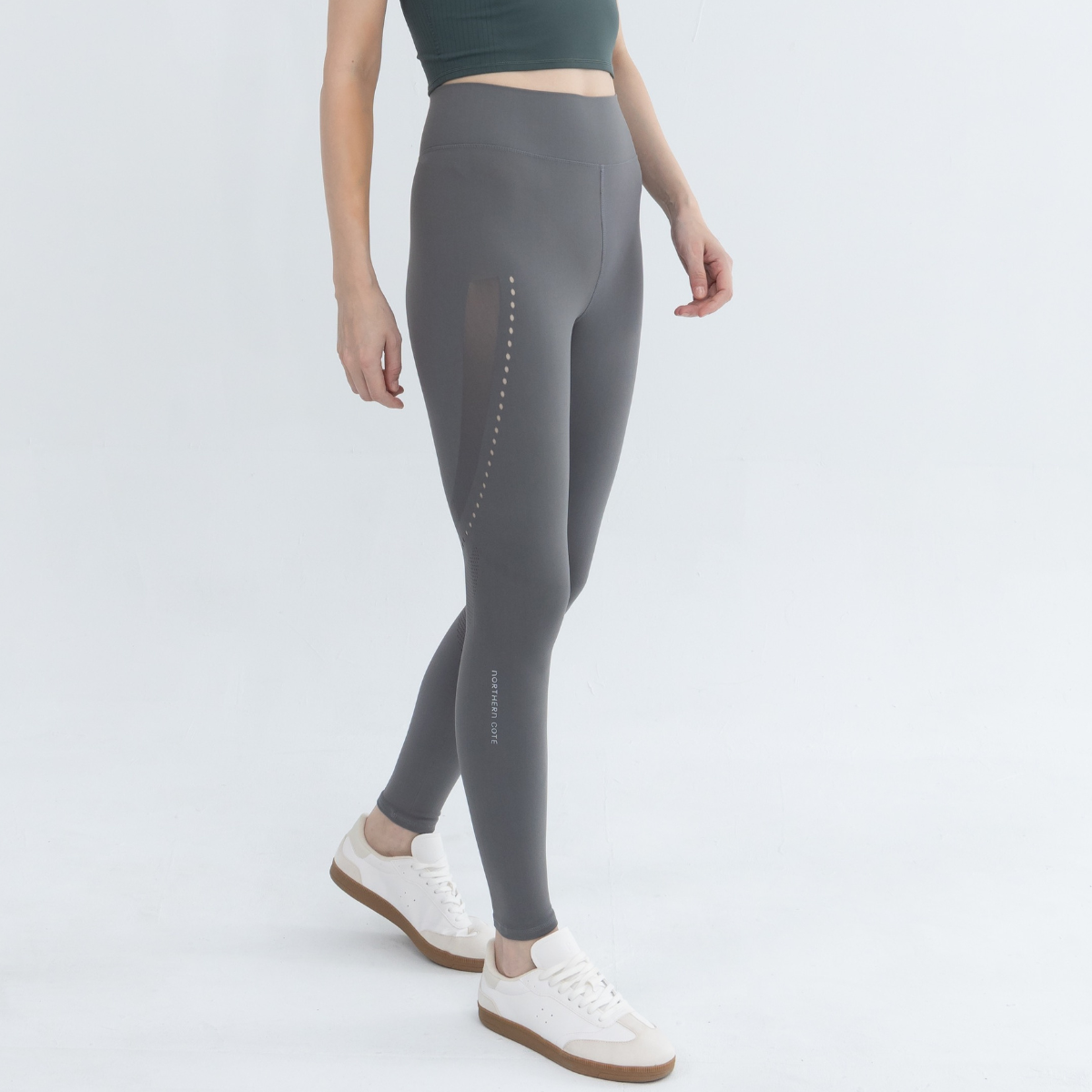 High-waist leggings paired with workout tights for a complete gym look
