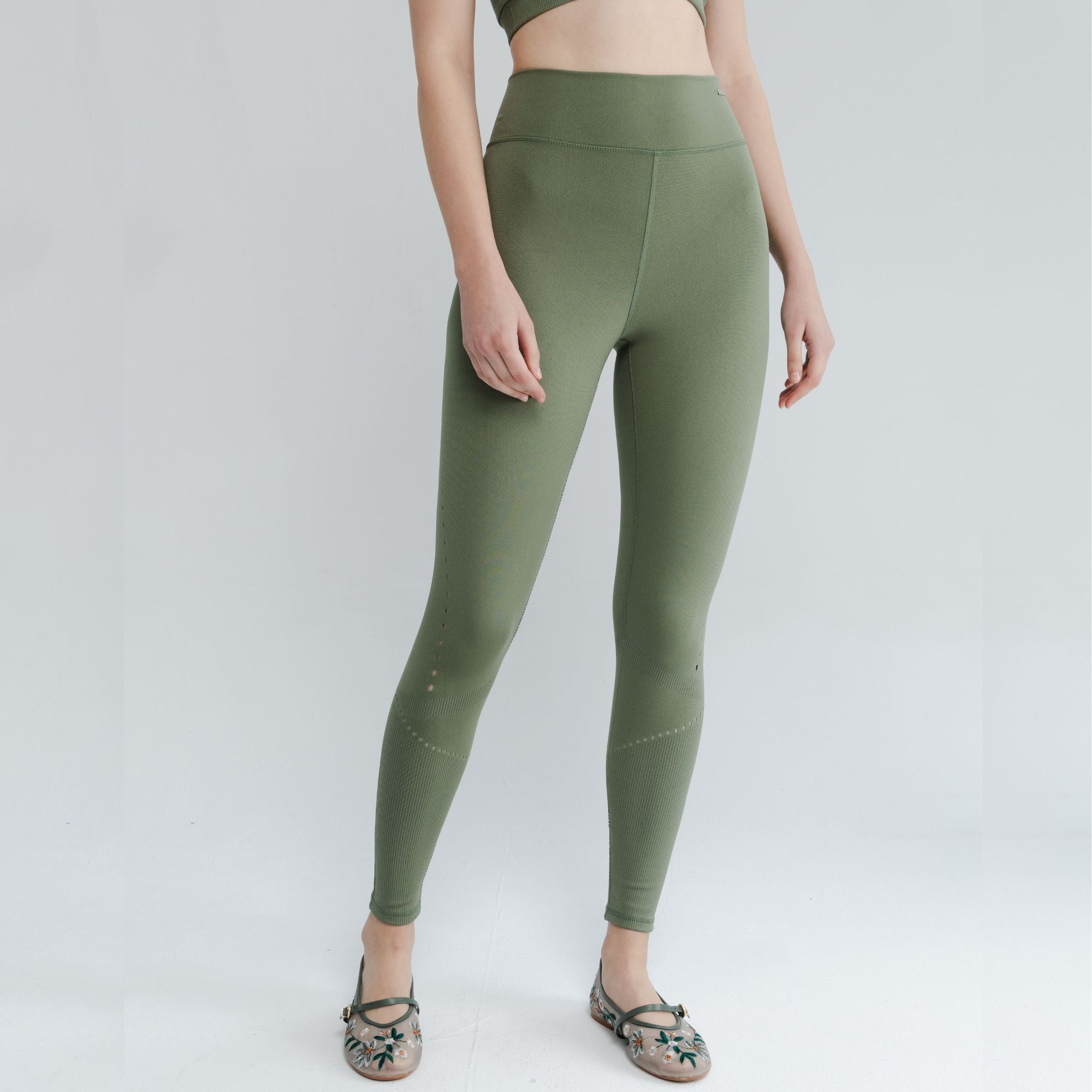 Model showcasing best high impact bras for running and cardio