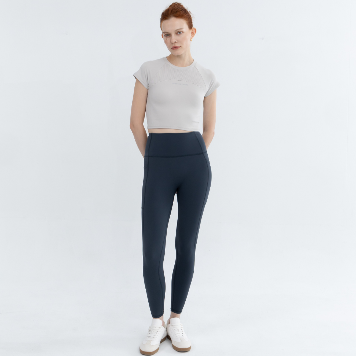 Seamless crop outfit styled with minimalist accessories for everyday wear