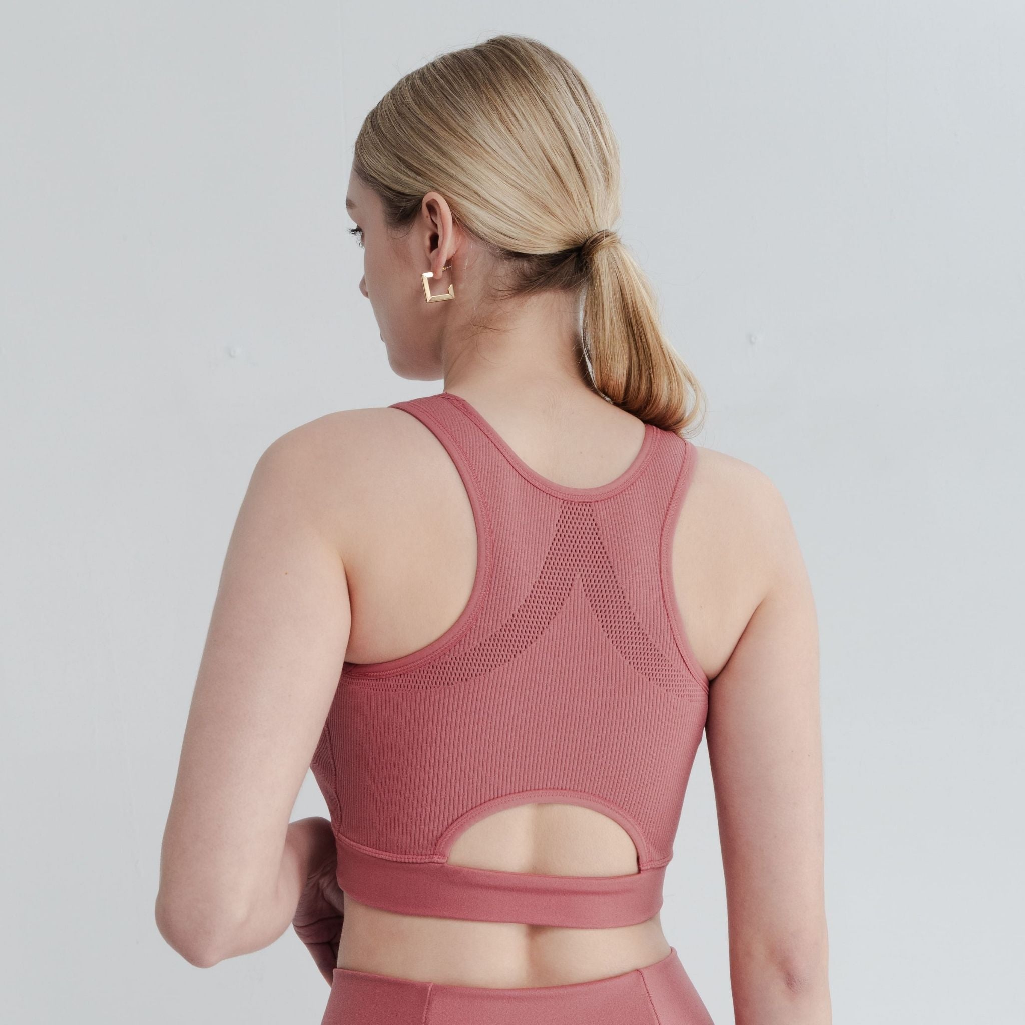 Woman wearing a comfortable high impact bra during workout