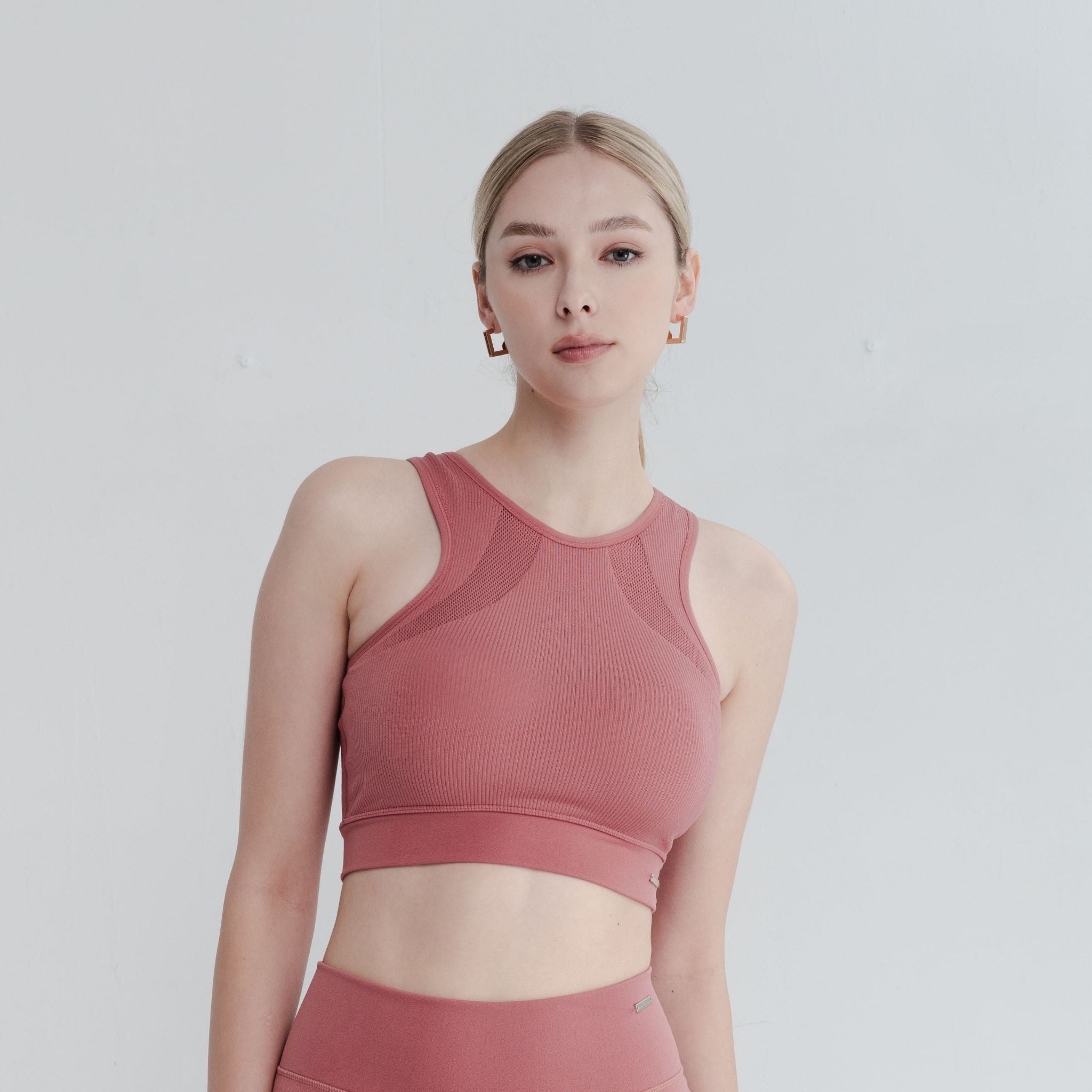 Close-up of High Neck Bra design – soft neckline and stretch-fit armholes for comfort.