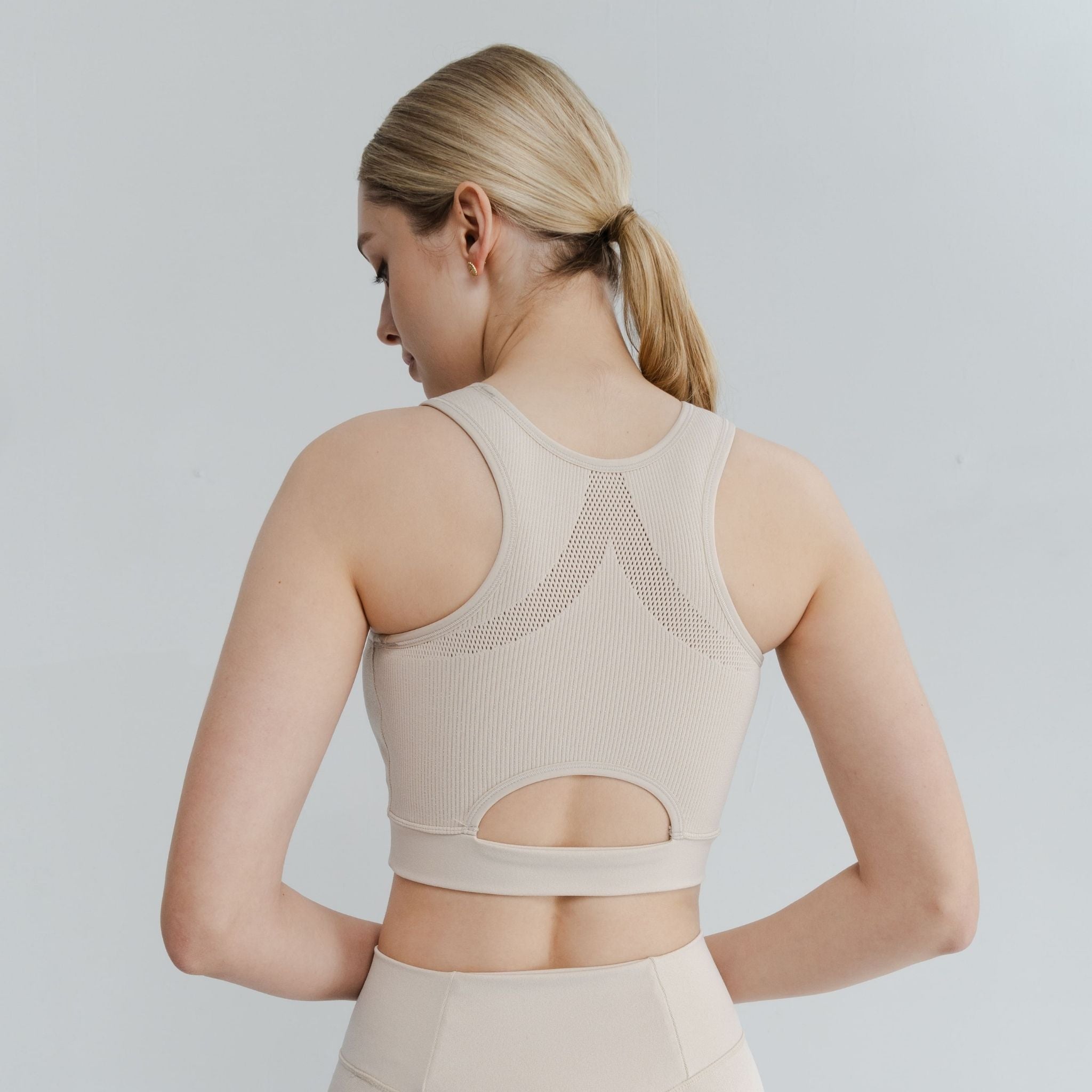 Racerback High Neck Bra featuring seamless construction and breathable design