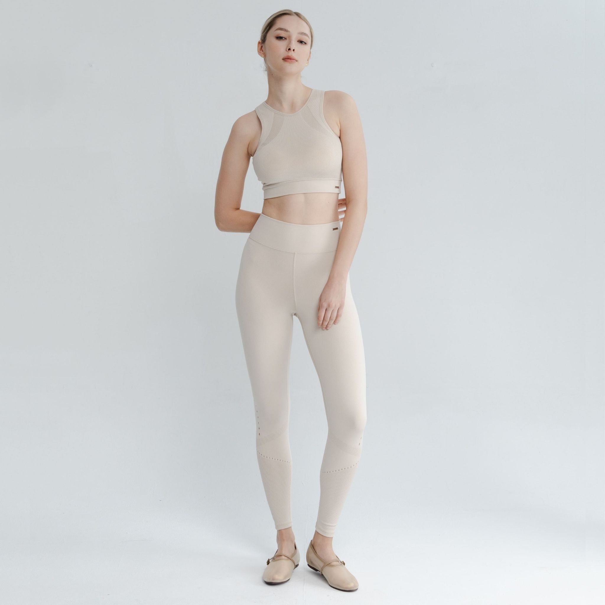 Woman wearing supportive High Neck Sports Bra during workout – built for high intensity