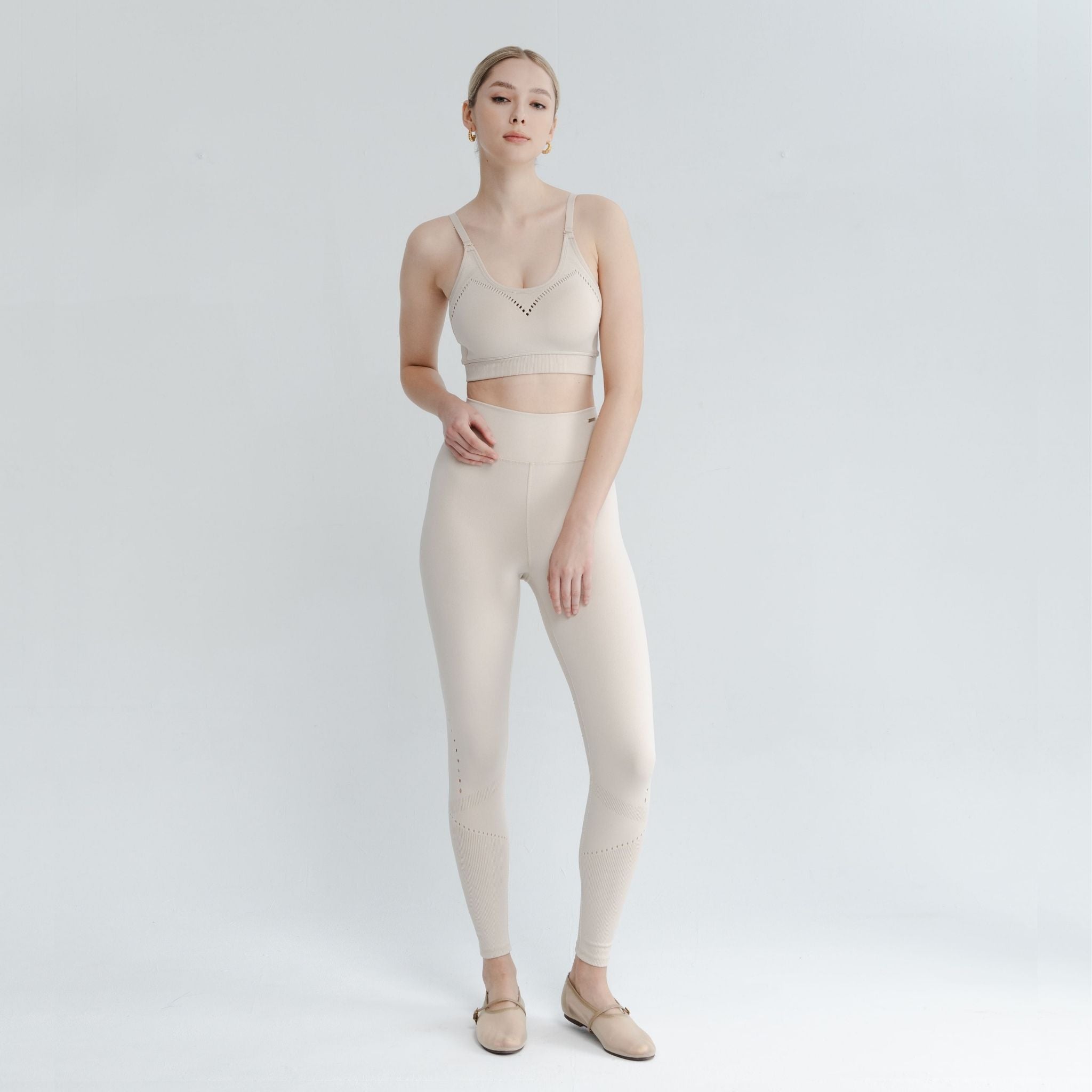 Model in motion wearing light support sports bra β designed for flexibility and everyday ease