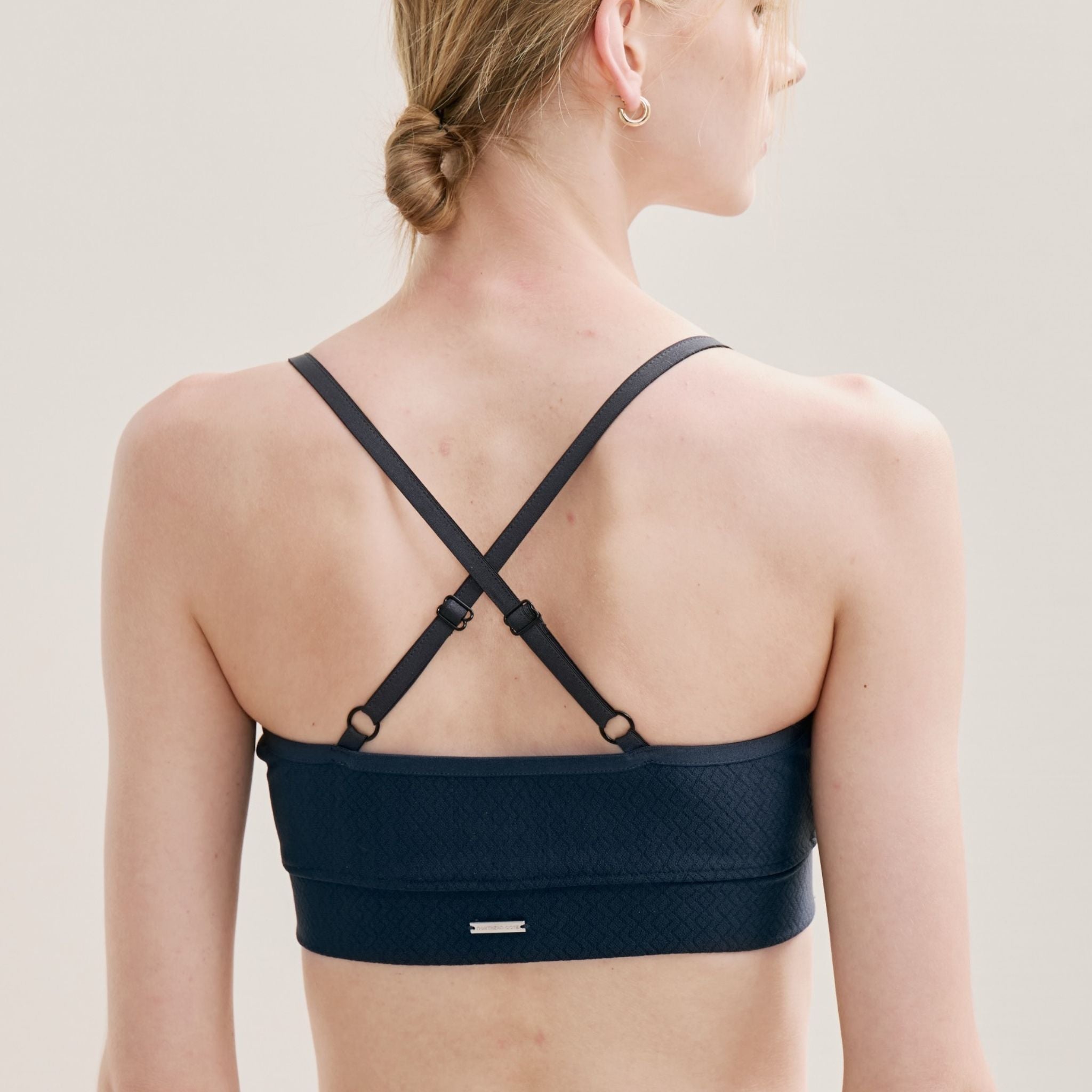 Back view of Cross Back Sports Bra with adjustable crisscross straps.
