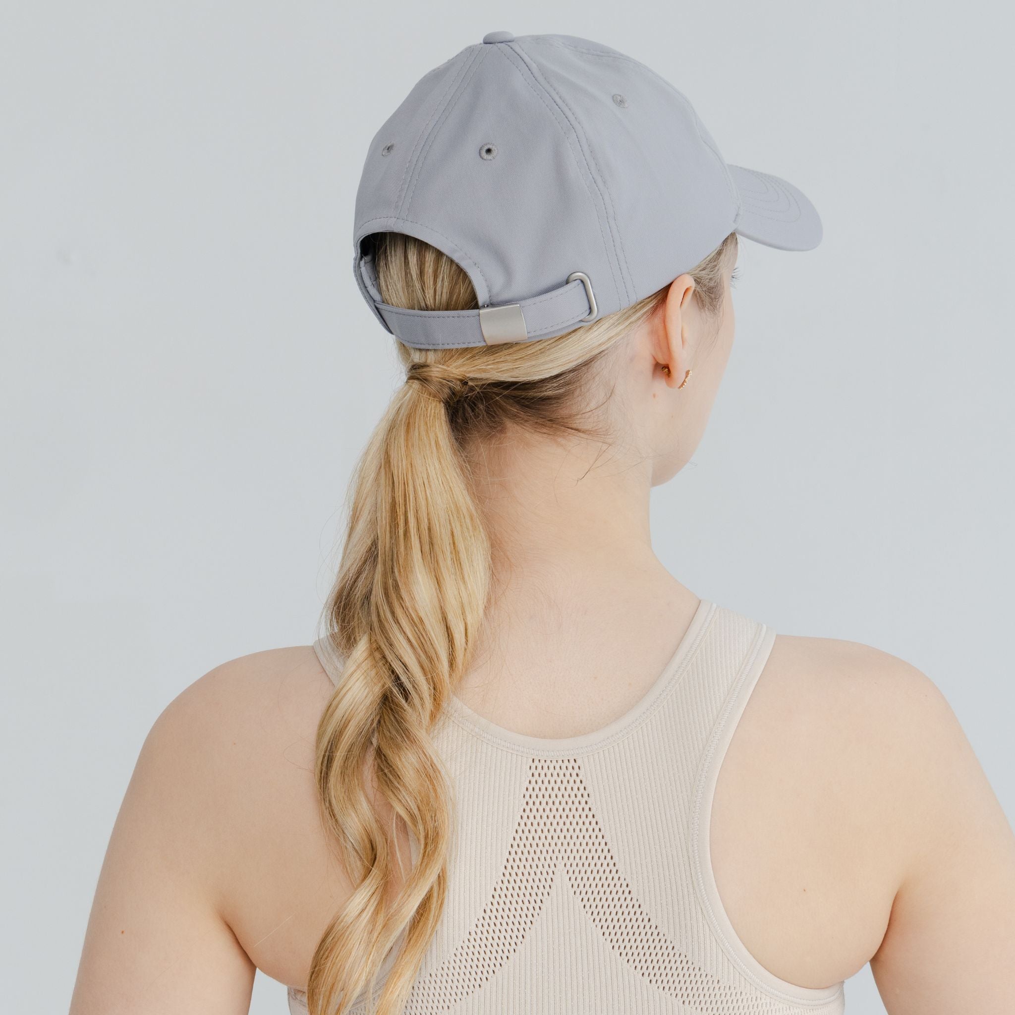 Performance running gear featuring a breathable cap