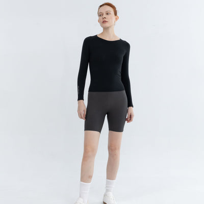 Front pose showcasing fitted Exercise Pullover design