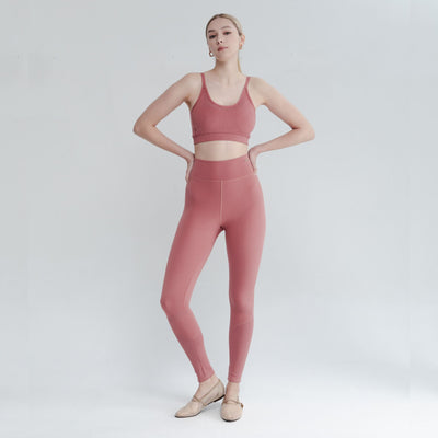 Woman wearing an open back bralette with open bra back styling, designed for unrestricted movement and cooling airflow.