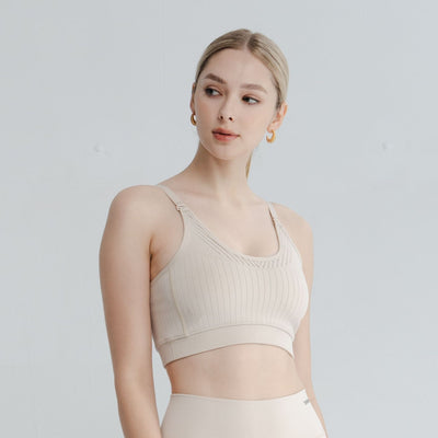 Side view of the open bralette showcasing breathable fabric, open back bra variations, and light-intensity support structure.