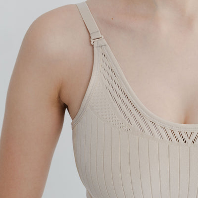 Supportive open back bra styled for light workouts and lounging.