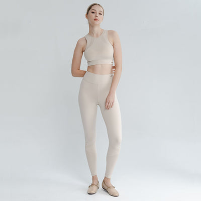 Woman wearing supportive High Neck Sports Bra during workout – built for high intensity