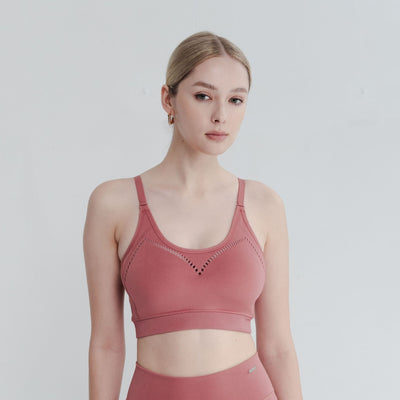 Model wearing light comfort bra, highlighting relaxed fit and soft, breathable material
