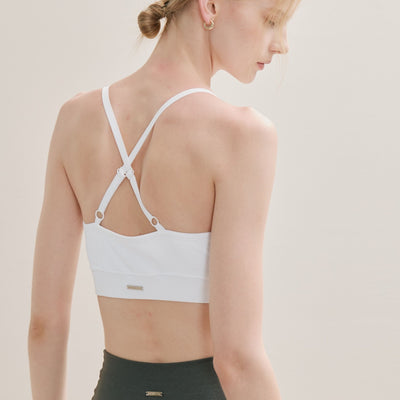 white Wireless Cross Back Bra showing adjustable cross shoulder straps.
