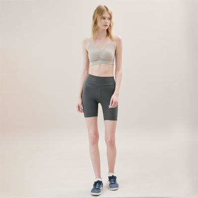 Model in nude-colored Crossed Back Bra with medium support for daily use.