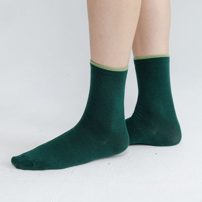 Close-up of ribbed crew socks showing breathable and moisture-wicking texture