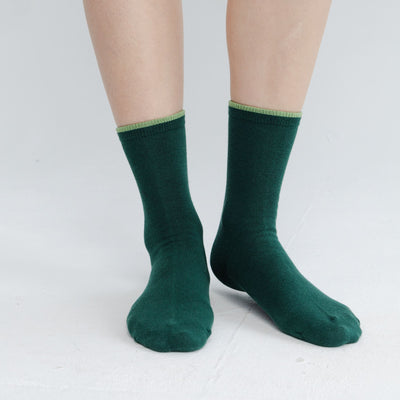 Model wearing comfortable crew socks  for everyday style